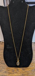 Vintage Joan Rivers Clear Egg & Bow Necklace