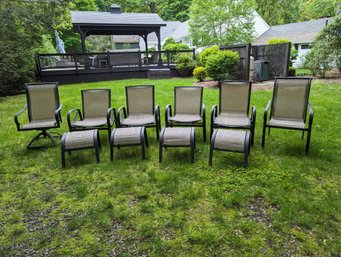 Collection Of Ten Pieces Of Aluminum Framed Patio Chairs And Ottomans