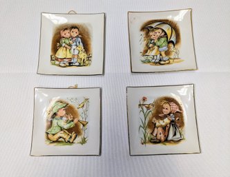 Set Of 4 Vintage Porcelain Small Hanging Wall Plates, With Hummel Inspired Pictures, Made In Japan