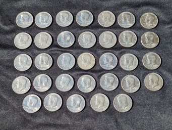 Collection Of 33 Kennedy Half Dollars