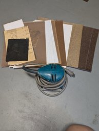 Makita Finishing Sander With Sheets Of Sandpaper