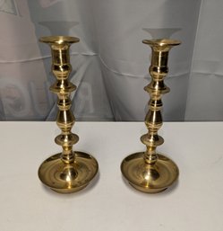 Pair Of Brass Candle Sticks With Round Base