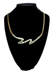 Gold Tone Zig Zag Necklace With Green Stones