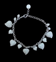 Lovely Silver Tone Bracelet With Heart Shaped Charms