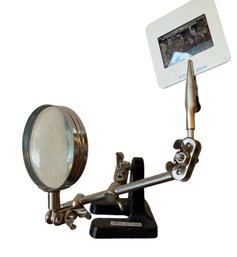 An Adjustable Magnifying Glass With Clamp