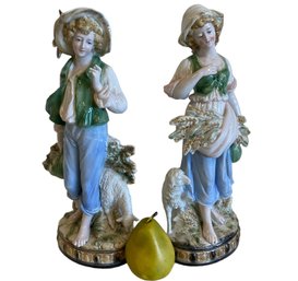 A Pair Of Tall Vintage Porcelain Figurines