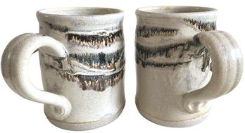 A Pair Of Signed Studio Pottery Mugs