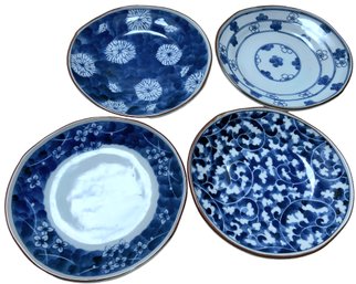 Four Vintage Japanese Oval Blue And White Plates