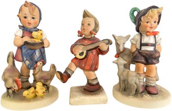 A Trio Of Vintage Hummel Figurines