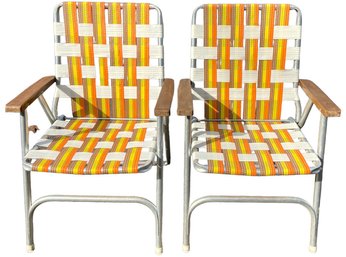 A Pair Of Mid Century Webbed Aluminum Patio Chairs