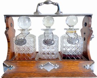 Regal Antique Tantalus Locking Cabinet With Crystal Decanters