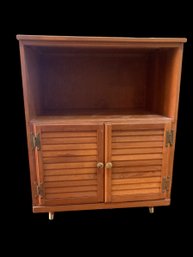 Nice Cabinet With Full Cubby On Top And Louvered Doors On The Bottom With Shelves