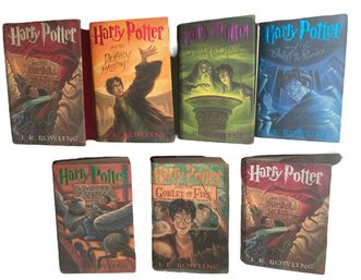 Seven  Harry Potter Hard Cover Volumes