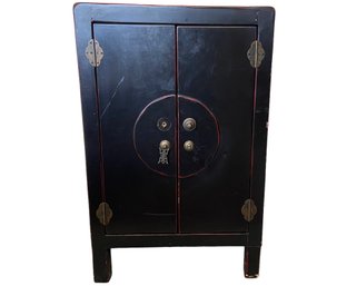 Vintage Black Asian Accent Cabinet With Red Accents