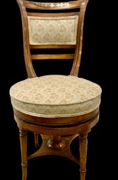 Antique Ladies Swivel Top Chair With Gold Accent On Back