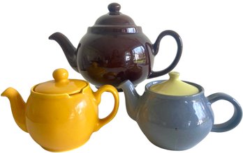 A Trio Of English Ceramic Teapots Including Denby