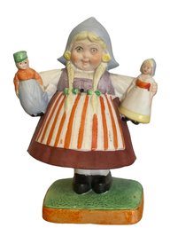 Antique German Nodder 'Articulating Girl With Dolls' (Q)