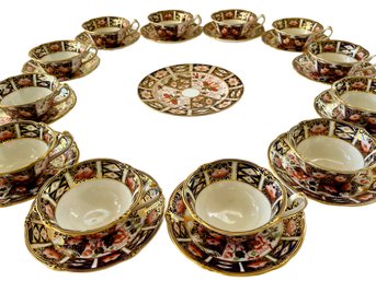 Royal Crown Derby Porcelain Tea Cups And Saucers With A Single Round Plate