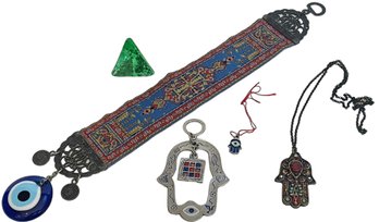 Collection Of Hamsas, Evil Eye Protectors And Pyramid Crystal