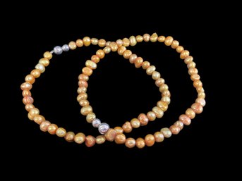 Pair Of Fresh Water Pearls Gold In Color