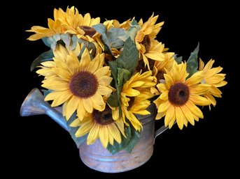 Faux Sun Flowers In A Watering Can