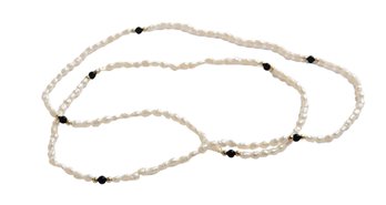 Seed Pearl Necklace With 14K Gold Beads And Black Onyx Beads