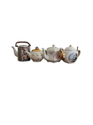 4 Collectible Teapots