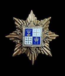 Gold Tone Brooch With Crest