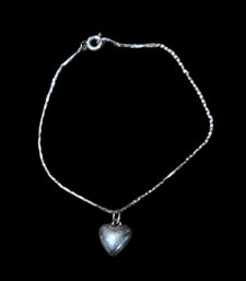 Heart Shaped Pendant On Silver Tone Chain Bracelet