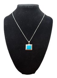Sterling Silver Chain With A Sterling Silver Turquoise Color Pendant