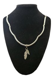 Long Silver Tone Necklace With Feather Pendant