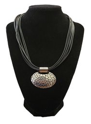 Black Corded Necklace With Large Silver Tone Pendant