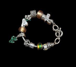 Silver Tone With Green And Copper Color Accents Charm Bracelet