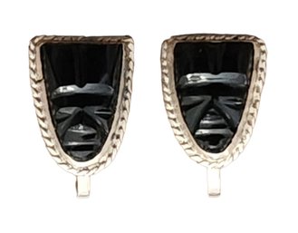 Sterling Silver And Onyx Color With A Carved Face Screw On Earrings