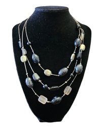 Necklace With Three Strands Of Black And Gray Beads