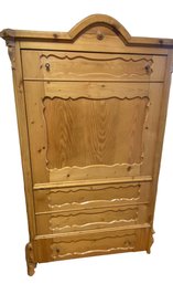 An Antique Single Door Pine Wood Armoire With One Drawer