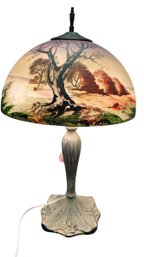 A Vintage Table Lamp Painted Glass Shade On Metal Base