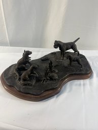 Vintage Dogs Encountering Otters Sculpture