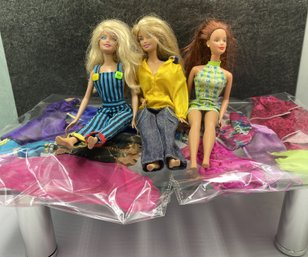 3 Barbies And Lots Of Clothing