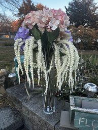 Silk Flowers In Tall Glass Vase