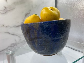 Pottery Clay Bowl Filled With Artificial Lemons