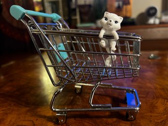 Cat In A Tiny Metal Shopping Cart