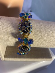 Vintage Juliana Bracelet: Blue Oval Carved Flower Bracelet.