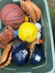 Bin Full Of Balls, Mitts And Other Sporting Equipment