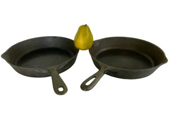 A Pair Of Vintage Cast Iron Frying Pans
