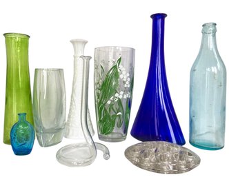 A Collection Of Vintage Glass Bottles And Vases