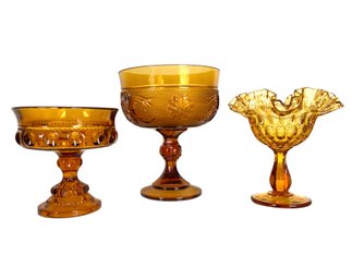 Three Vintage Amber Glass Pedestal Bowls