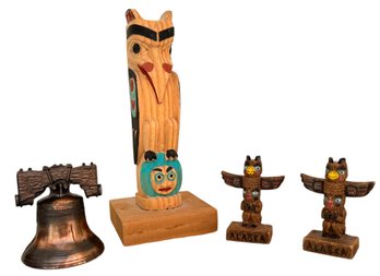 Collection Of Wood Totems And Liberty Bell Souvenirs