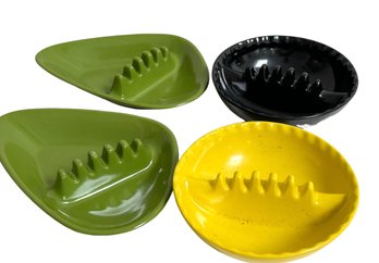 Four MCM Plastic Ashtrays