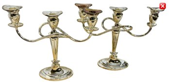 A Pair Of Silver Tone Color Candelabra